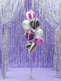 Shimmer curtain with balloon bouquet.