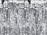 Silver glitter curtain close up image.