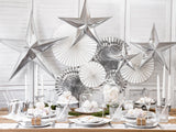 Various types of silver table decorations.