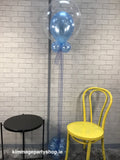 Communion bubble balloon with tulle and balloon base.
