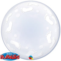 Clear balloon with baby footprints.