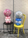 Air filled balloon designs for a table.