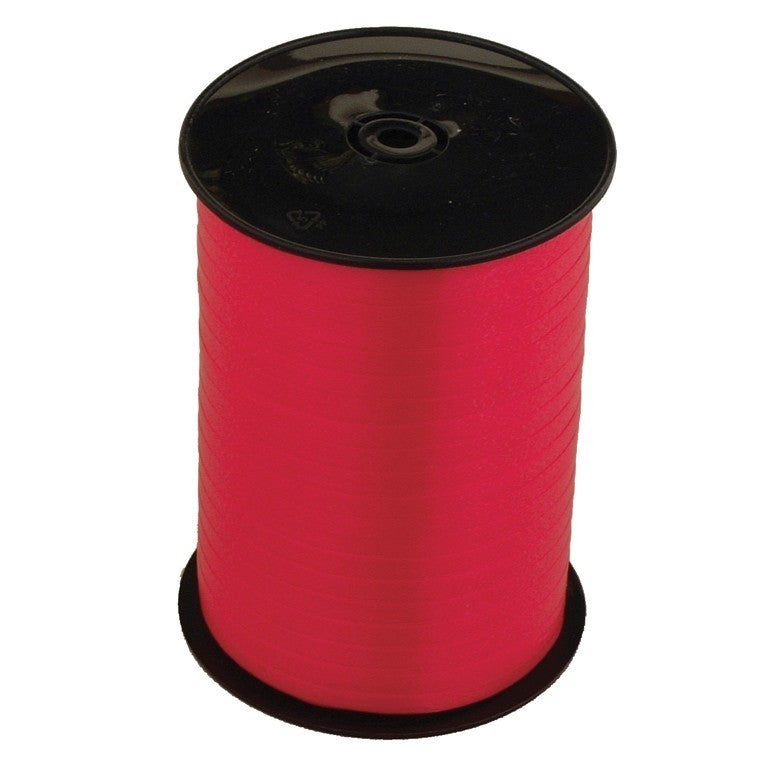 Roll of red ribbon.