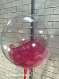 Bubble balloon with tulle inside.