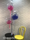 Blue and pink bubble balloons with tulle.